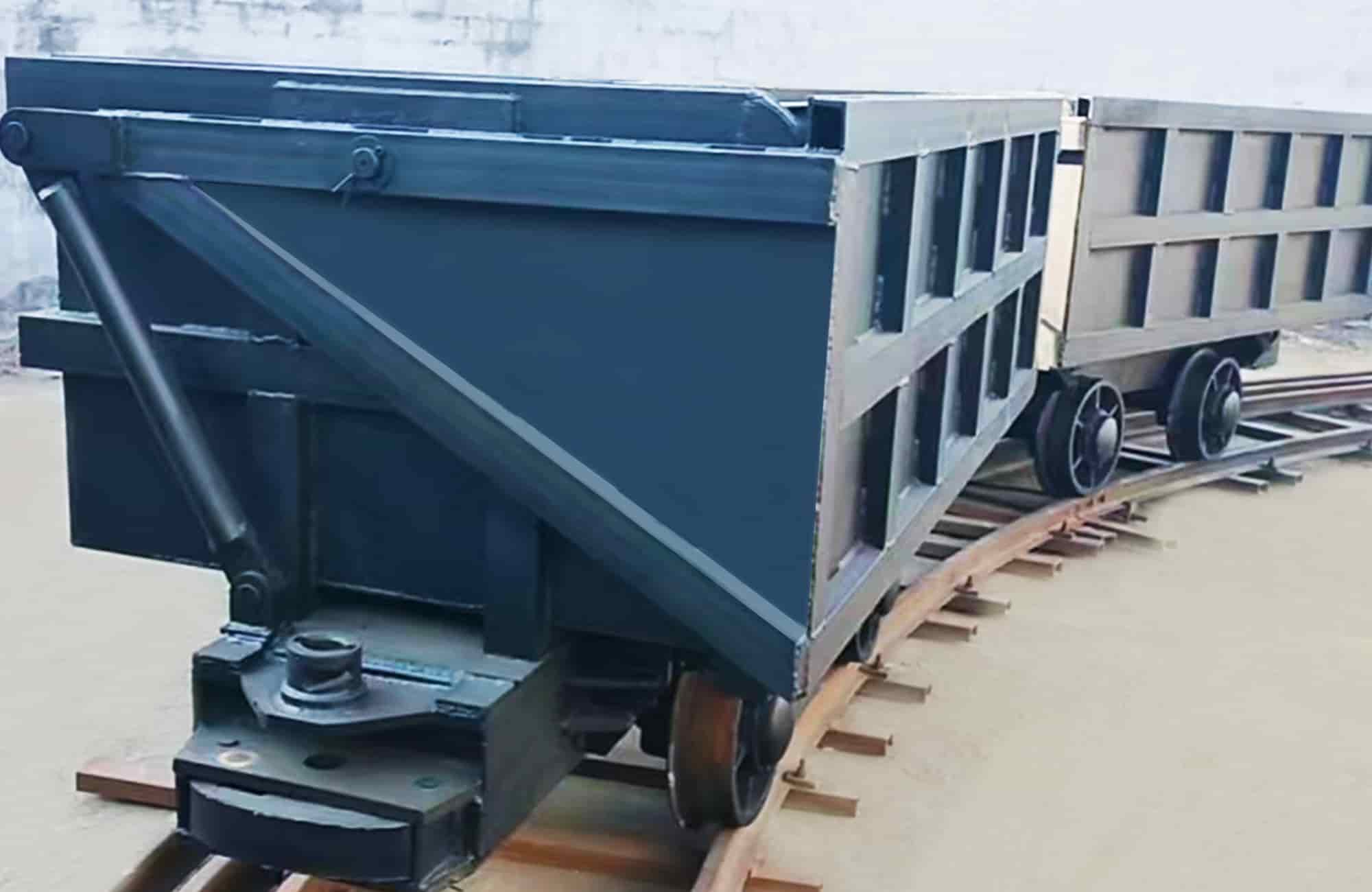 曲軌側卸式礦車
